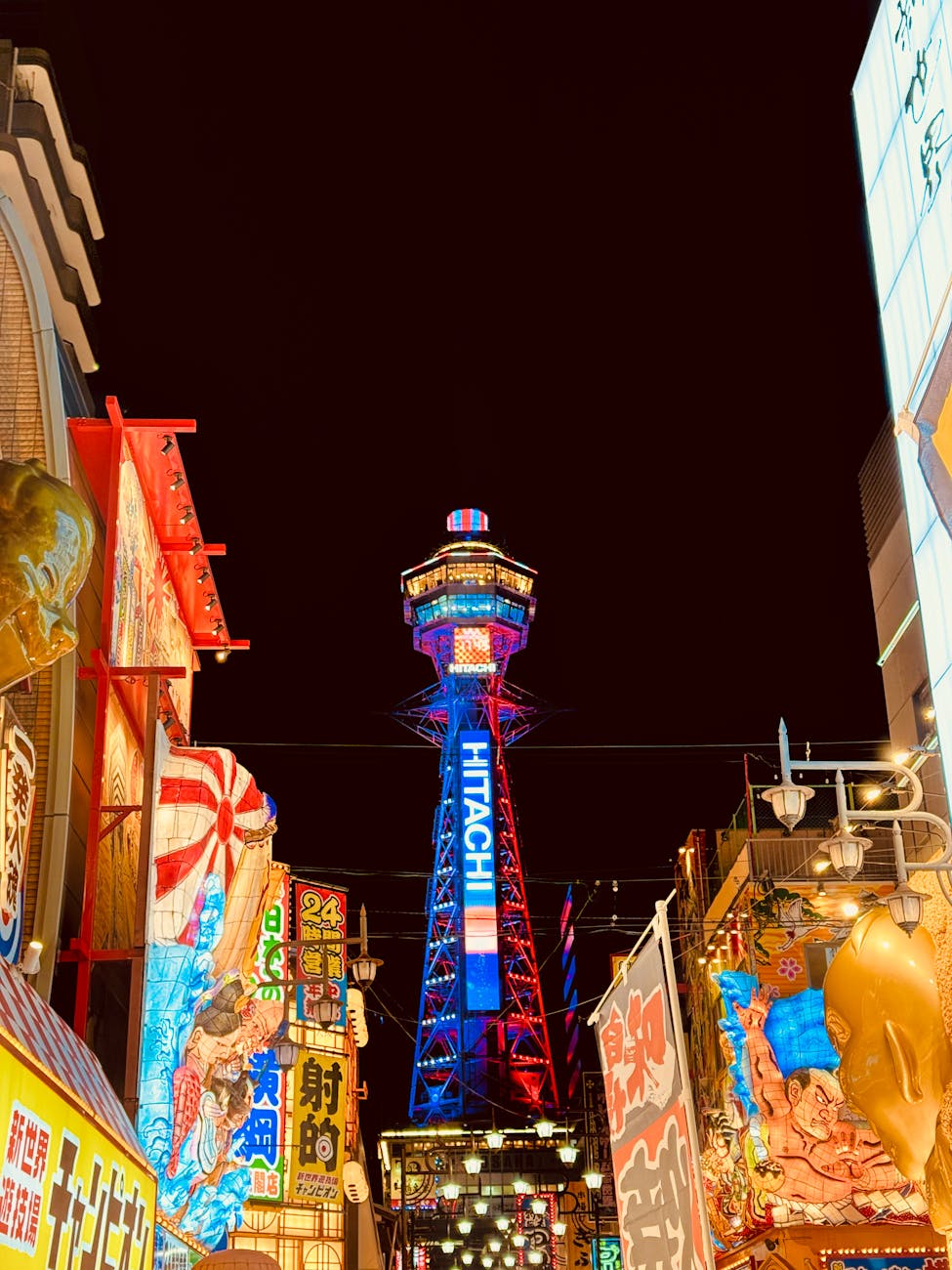 vibrant night scene of osaka s tsutenkaku tower